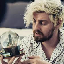 Jacob Rabon the Fourth holding a snow globe. Lead singer and producer of the band Ace of Hearts. Also a YouTuber.